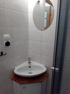 Ванная комната в Atrakcyjna kawalerka w Gdyni