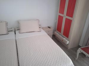 Postel nebo postele na pokoji v ubytování MELI-IOS