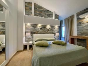 Voodi või voodid majutusasutuse Borgo del Nespolo toas