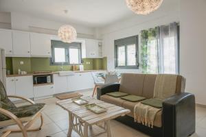Kuchyň nebo kuchyňský kout v ubytování Chrisambelos Apartments
