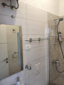 Kúpeľňa v ubytovaní Kuzma Rooms and Apartments