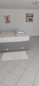 Postel nebo postele na pokoji v ubytování Apartment sv.nikole