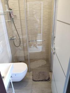 Kúpeľňa v ubytovaní Kuzma Rooms and Apartments + 37 fotografií