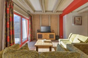 Televízia a/alebo spoločenská miestnosť v ubytovaní La Blaitière - Luxe Apart Center Chamonix , Next to Piste Planard - By Cozee Rentals