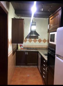 Kuchnia lub aneks kuchenny w obiekcie Chipiona Apartamento Bajo Centro Parking Incluido WiFi GRATIS