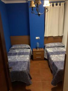 Łóżko lub łóżka w pokoju w obiekcie Chipiona Apartamento Bajo Centro Parking Incluido WiFi GRATIS