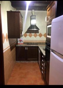 Kuchnia lub aneks kuchenny w obiekcie Chipiona Apartamento Bajo Centro Parking Incluido WiFi GRATIS