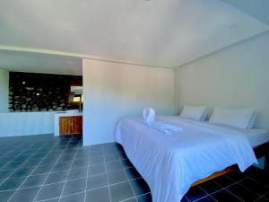 Voodi või voodid majutusasutuse Ocean View Villas toas