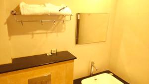 Fotografie z fotogalerie ubytování Hotel Rhythm Grand Suite v destinaci Tiruččiráppalli