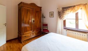 A bed or beds in a room at Agriturismo dalla Mimmi