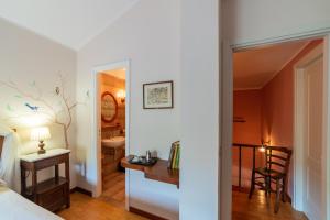 A bed or beds in a room at Agriturismo dalla Mimmi