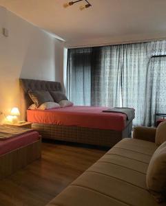 Postel nebo postele na pokoji v ubytování ZANI Hostel