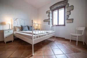 Ένα ή περισσότερα κρεβάτια σε δωμάτιο στο Old town studio and apartment
