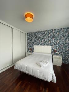 Posteľ alebo postele v izbe v ubytovaní Hostal Portofino