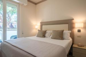 Ένα ή περισσότερα κρεβάτια σε δωμάτιο στο Residence Capitol +74 φωτογραφίες