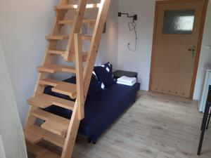 Postel nebo postele na pokoji v ubytování OWR Przystań