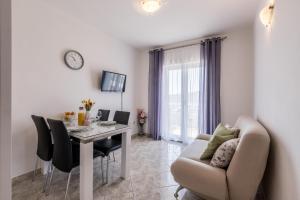 Posezení v ubytování Family Apartments Jadrijević