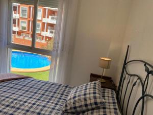 Postel nebo postele na pokoji v ubytování Apartamento ANA Mar de Denia
