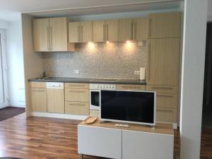 Kuchyň nebo kuchyňský kout v ubytování Schöne Wohnung in ruhiger Lage mit Garten.