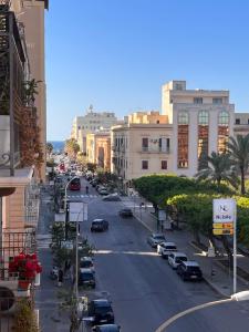 a view of a city street with cars parked at Apartament BellaPola Trapani in Trapani