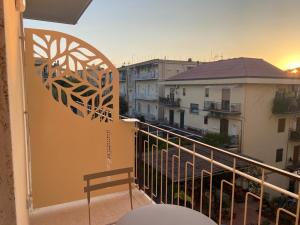 a balcony with a view of a city at Pianohome Sorrento in Piano di Sorrento