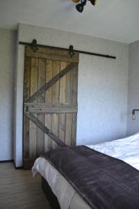 Postel nebo postele na pokoji v ubytování Nikolaierhaus