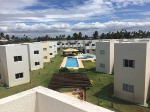 Výhled na bazén z ubytování Chalé Paraíso -Maracajaú 4- Casa 38 - Beira-mar nebo okolí