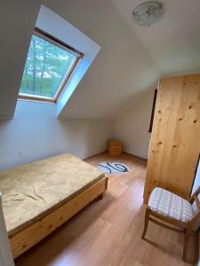 Ліжко або ліжка в номері Holiday Guest House