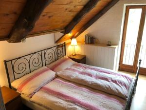 En eller flere senge i et værelse på Cà dal Bosc e Cà sgrüscia