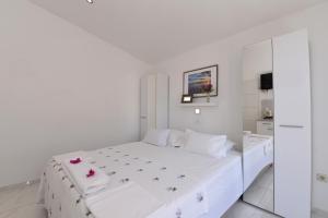 Posteľ alebo postele v izbe v ubytovaní Makarska sea view rooms