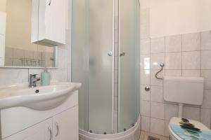 Kúpeľňa v ubytovaní Makarska sea view rooms
