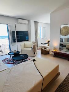Uma TV ou centro de entretenimento em Portobello Boutique Hotel