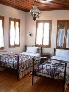 Posteľ alebo postele v izbe v ubytovaní Guesthouse Kolenti
