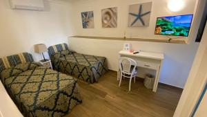 Posezení v ubytování Capri Bougainville Luxury Boutique Hotel