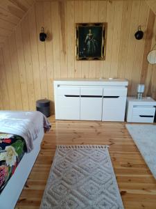 Posteľ alebo postele v izbe v ubytovaní Agroturystyka Podlasie dom nad stawem