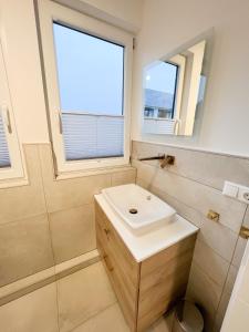 Koupelna v ubytování Dyke Appartements