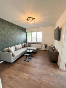 Posezení v ubytování Dyke Appartements