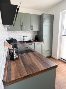 Kuchyň nebo kuchyňský kout v ubytování Dyke Appartements