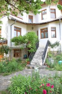 Κήπος έξω από το Guest House Astra