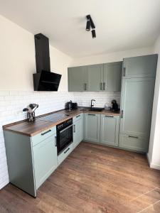 Kuchyň nebo kuchyňský kout v ubytování Dyke Appartements