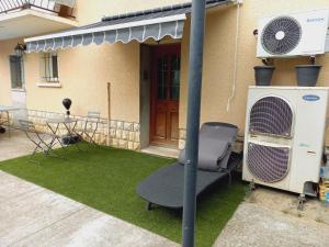Patio nebo venkovní prostory v ubytování Moissac Charmant Appartement avec Jardin