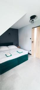 Posteľ alebo postele v izbe v ubytovaní Pogodny Domek + 36 fotografií