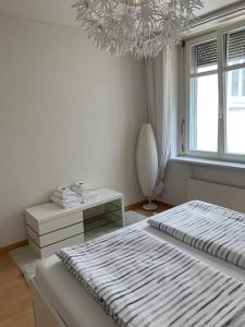 Postel nebo postele na pokoji v ubytování over-night City-Flat
