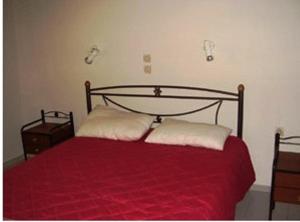 Postel nebo postele na pokoji v ubytování Pantelios Village
