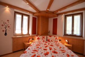 Postel nebo postele na pokoji v ubytování Bed and Breakfast Galet
