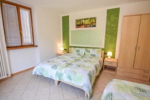Postel nebo postele na pokoji v ubytování Bed and Breakfast Galet
