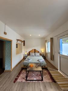 Кровать или кровати в номере The Handmade House Azores