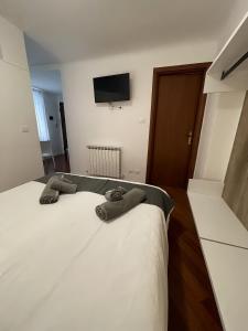 Posteľ alebo postele v izbe v ubytovaní CERERIA DELTa