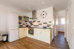 Kuchyň nebo kuchyňský kout v ubytování Can Pons Apartment
