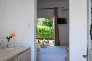 TV a/nebo společenská místnost v ubytování Wilde Rose Hotel